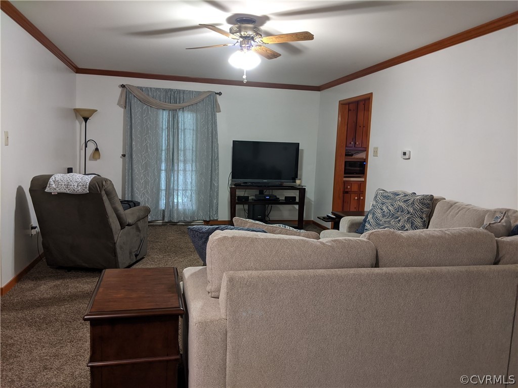 6900 Berrystone Road Chesterfield, VA 23831 - Photo 11 of 23 a living room with furniture and a flat screen tv