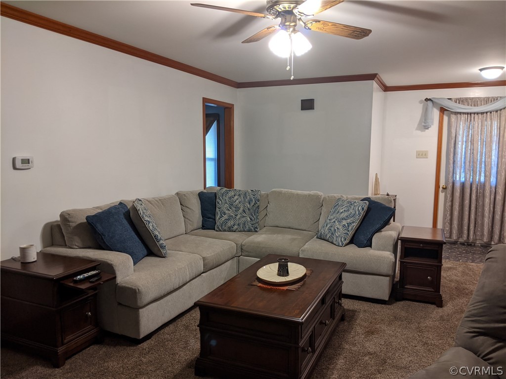 6900 Berrystone Road Chesterfield, VA 23831 - Photo 12 of 23 a living room with furniture and a flat screen tv