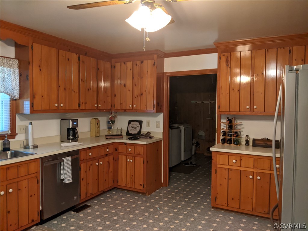 6900 Berrystone Road Chesterfield, VA 23831 - Photo 15 of 23 a kitchen with a sink stove and cabinets