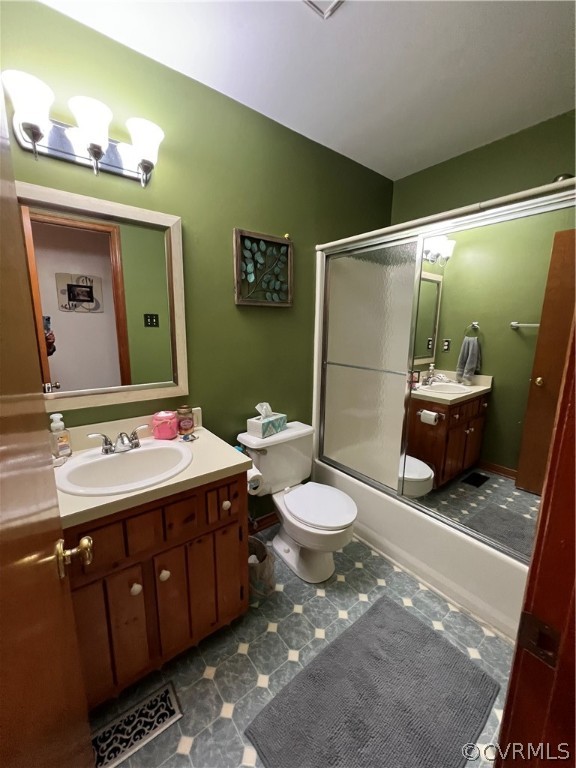 6900 Berrystone Road Chesterfield, VA 23831 - Photo 21 of 23 a bathroom with a sink a toilet a mirror and vanity