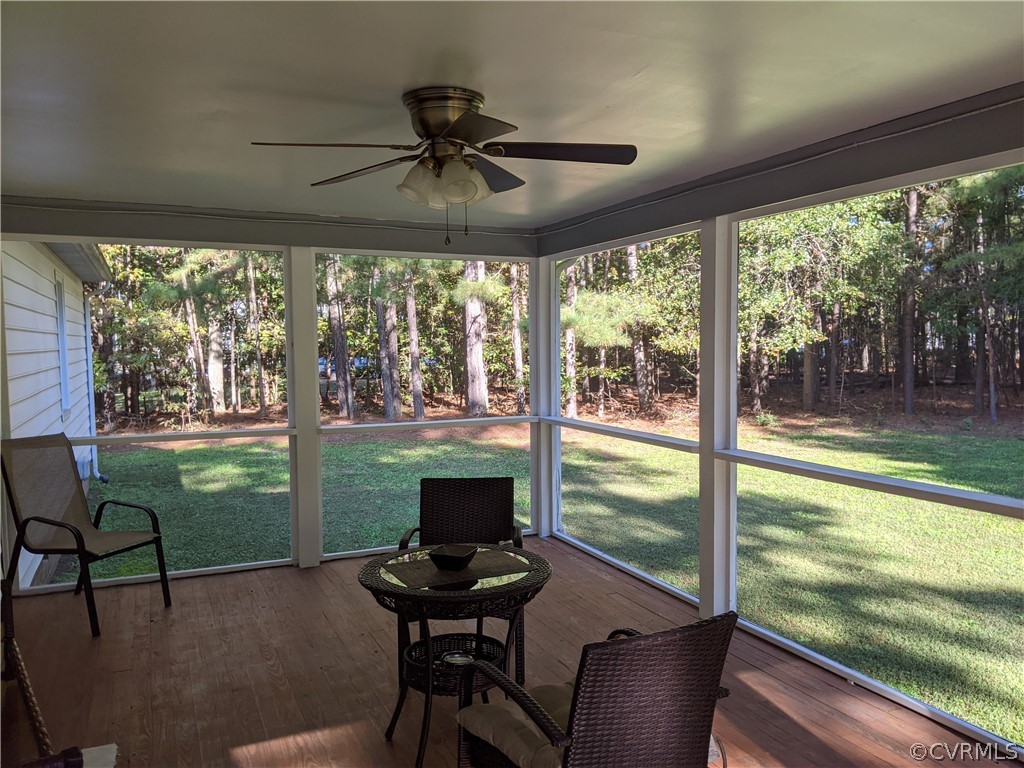 6900 Berrystone Road Chesterfield, VA 23831 - Photo 3 of 23 a view of a dining room with furniture window and outside view