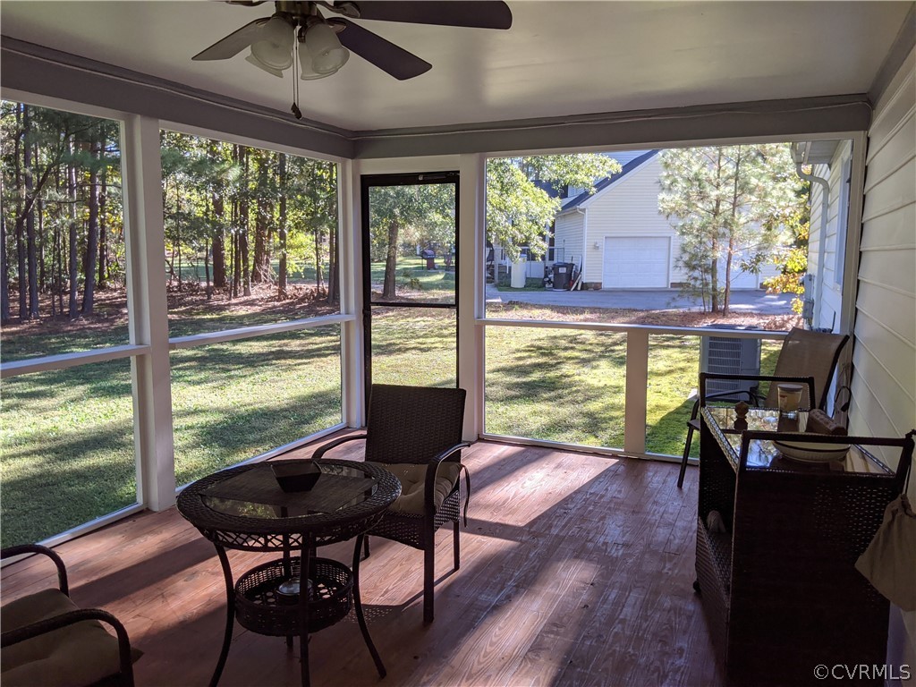 6900 Berrystone Road Chesterfield, VA 23831 - Photo 4 of 23 a view of a dining room with furniture window and outside view