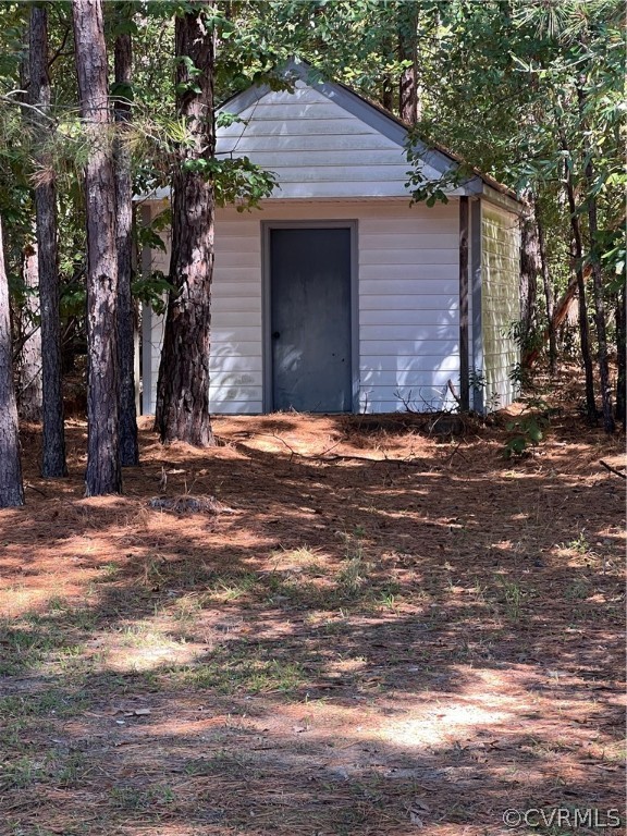6900 Berrystone Road Chesterfield, VA 23831 - Photo 7 of 23 a front view of a house with a yard
