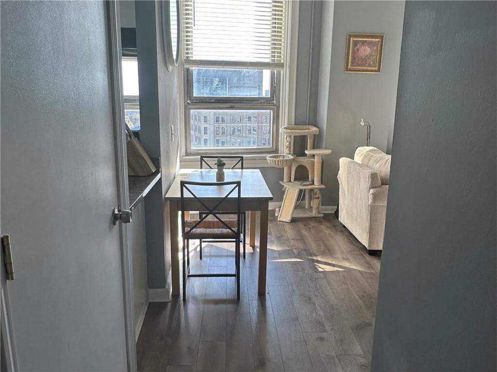 a view of a livingroom with furniture and window