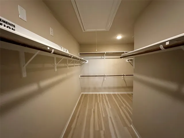 a view of a room with racks on the wall