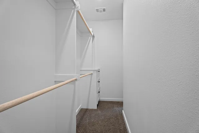 a view of hallway with stairs