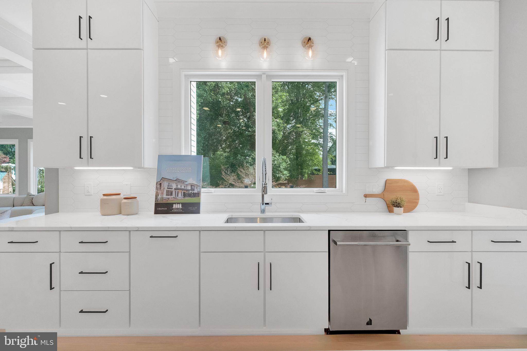 6226 Kellogg Drive McLean, VA 22101 - Photo 24 of 89 a kitchen with white cabinets and window