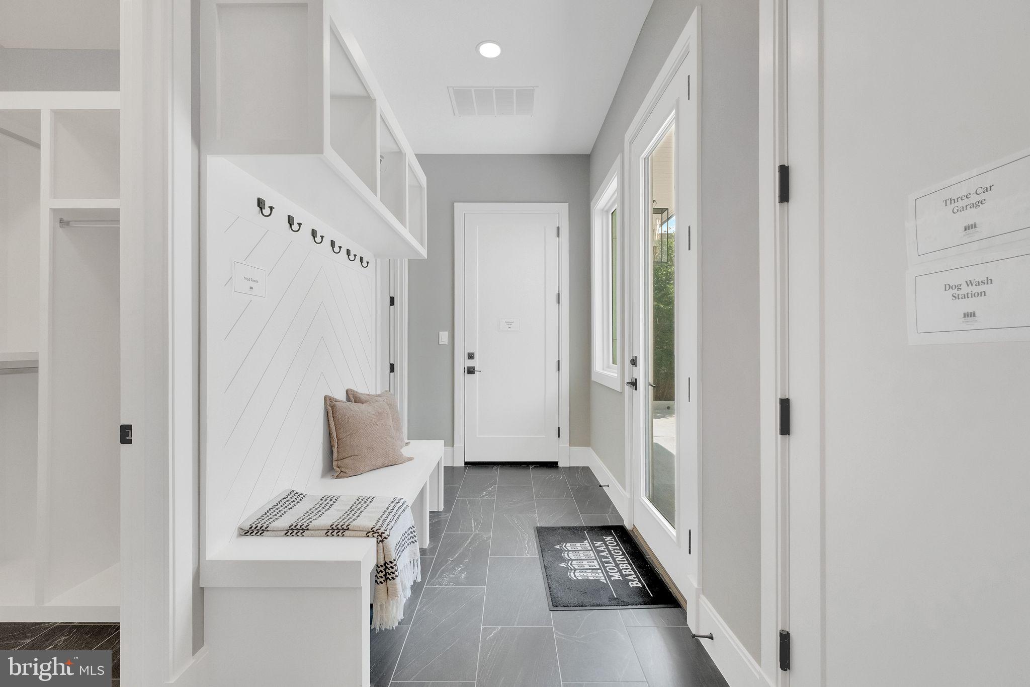 6226 Kellogg Drive McLean, VA 22101 - Photo 28 of 89 a view of a hallway with white walls and white cabinet