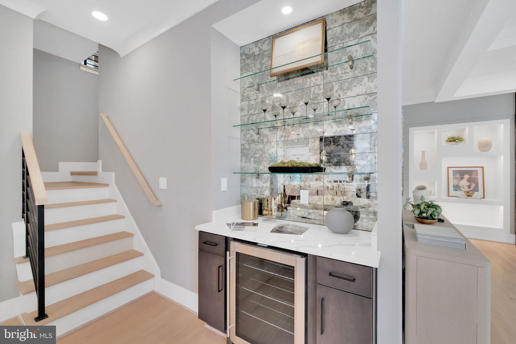 6226 Kellogg Drive McLean, VA 22101 - Photo 30 of 89 a bathroom with a sink double vanity and a mirror
