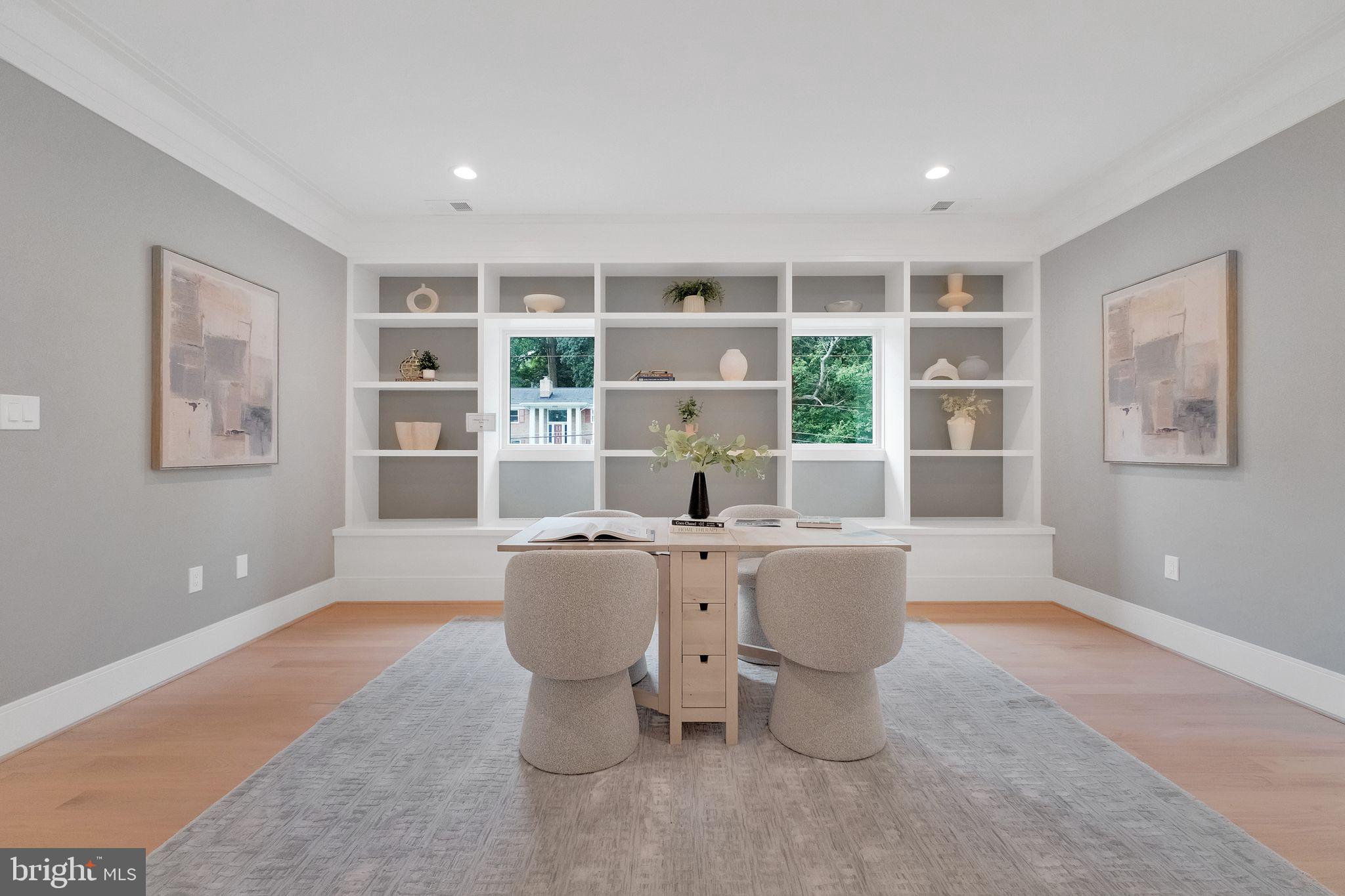 6226 Kellogg Drive McLean, VA 22101 - Photo 34 of 89 a living room with furniture a large window and wood floor