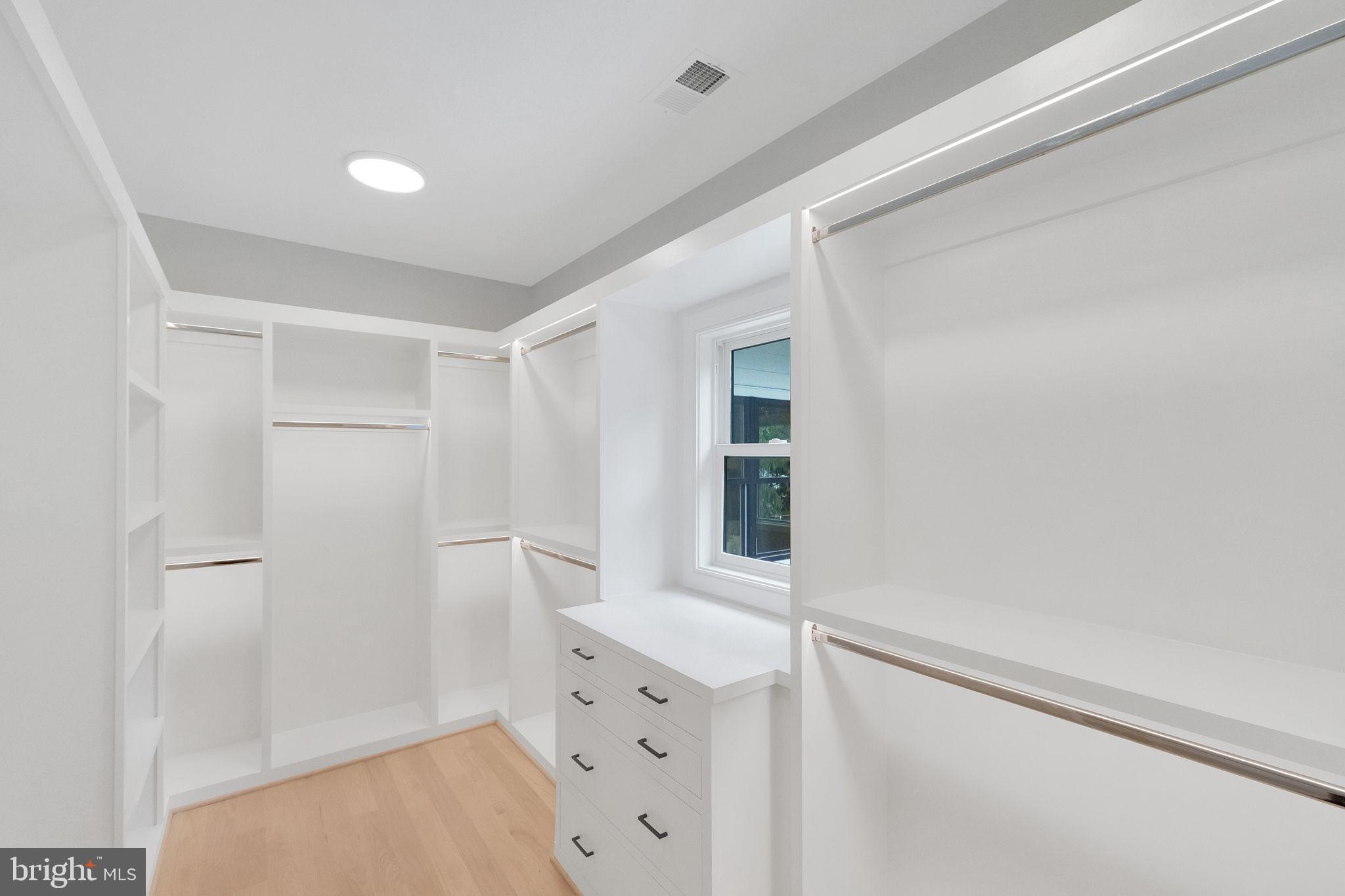 6226 Kellogg Drive McLean, VA 22101 - Photo 42 of 89 a view of walk in closet with empty racks