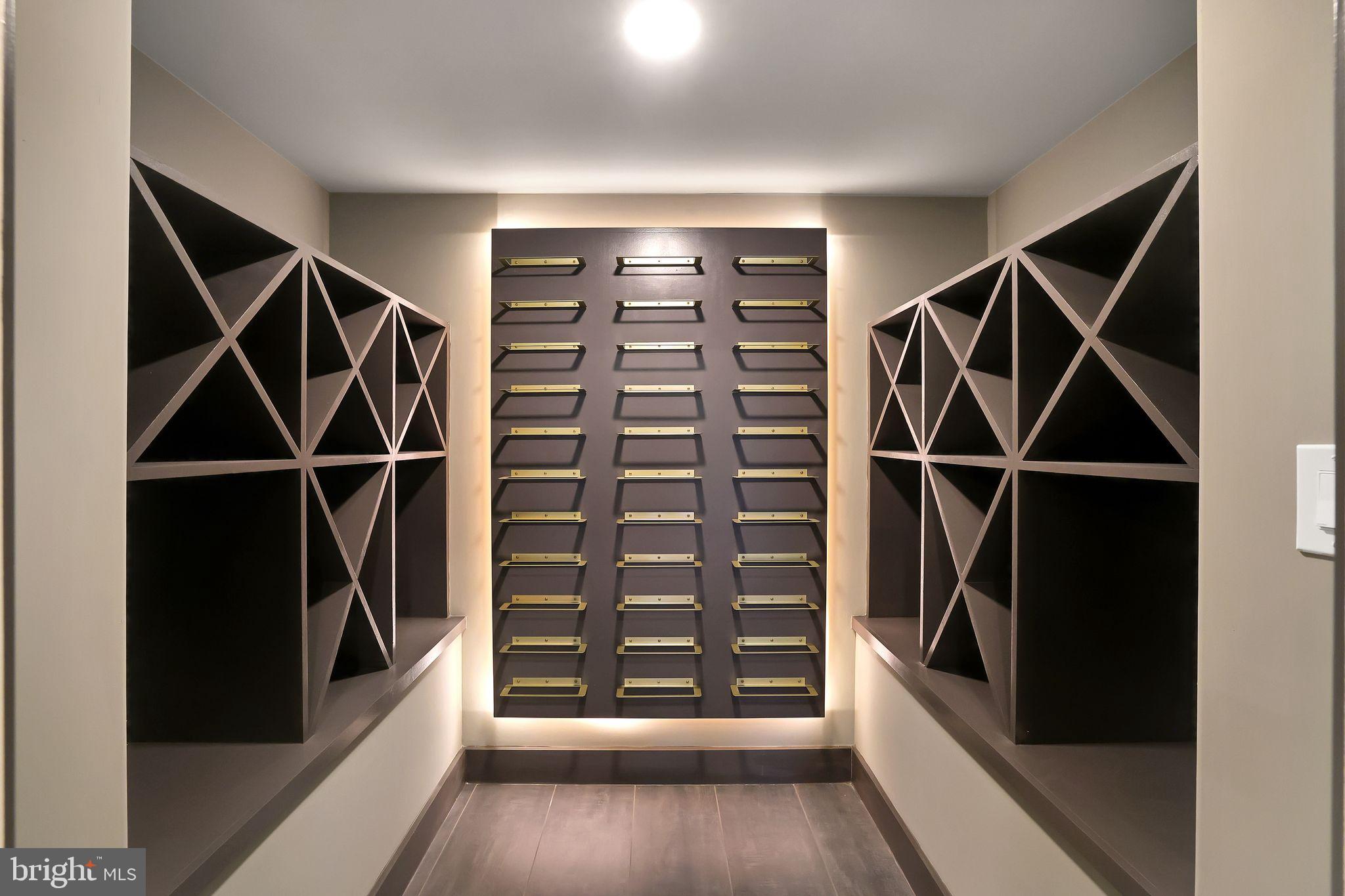 6226 Kellogg Drive McLean, VA 22101 - Photo 75 of 89 a view of walk in closet with wooden floor