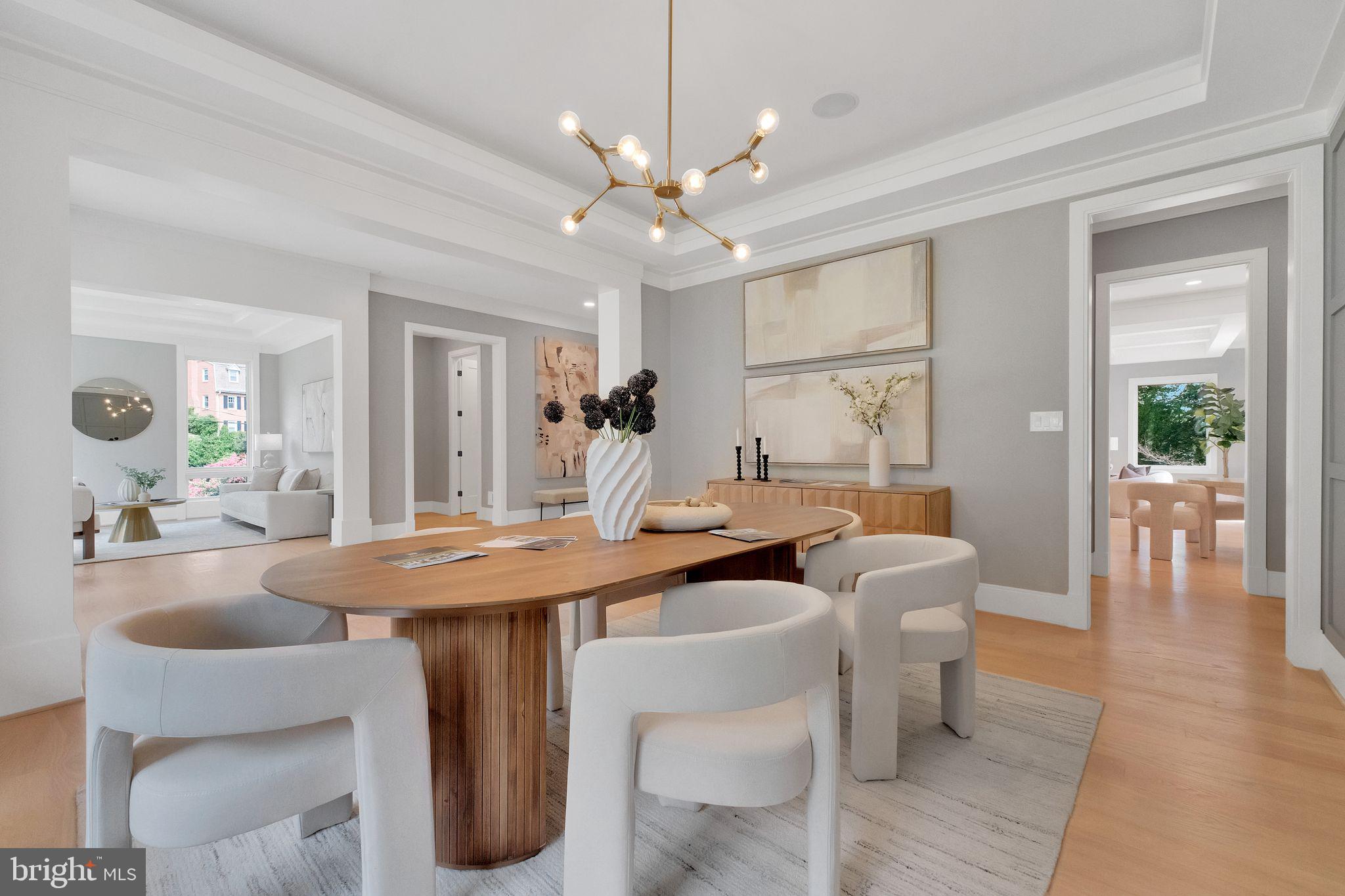 6226 Kellogg Drive McLean, VA 22101 - Photo 8 of 89 a dining room with chandelier and wooden floor