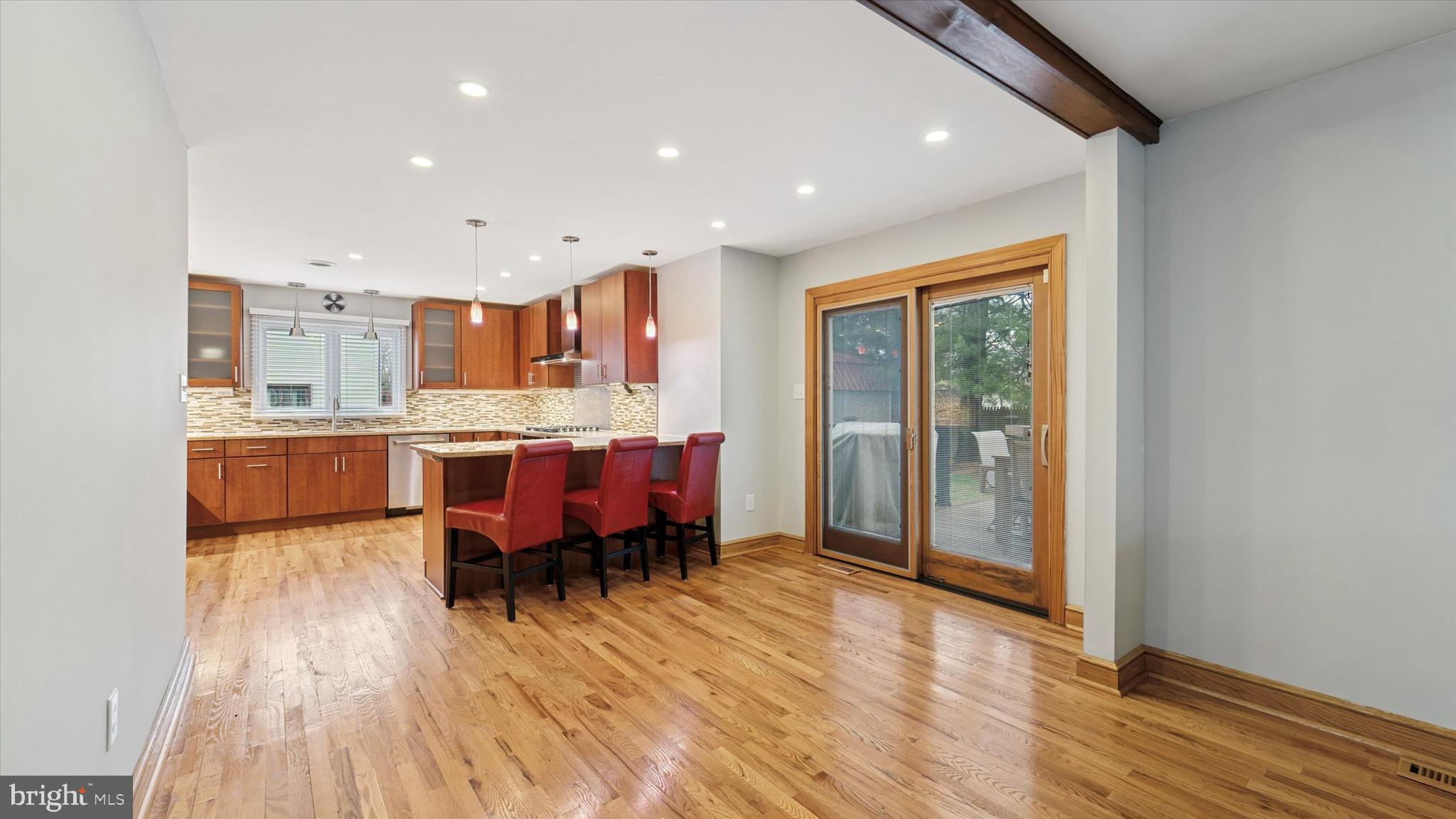 115 Union Mill Terrace Mount Laurel, NJ 08054 - Photo 12 of 31 a large kitchen with stainless steel appliances kitchen island granite countertop a sink and cabinets