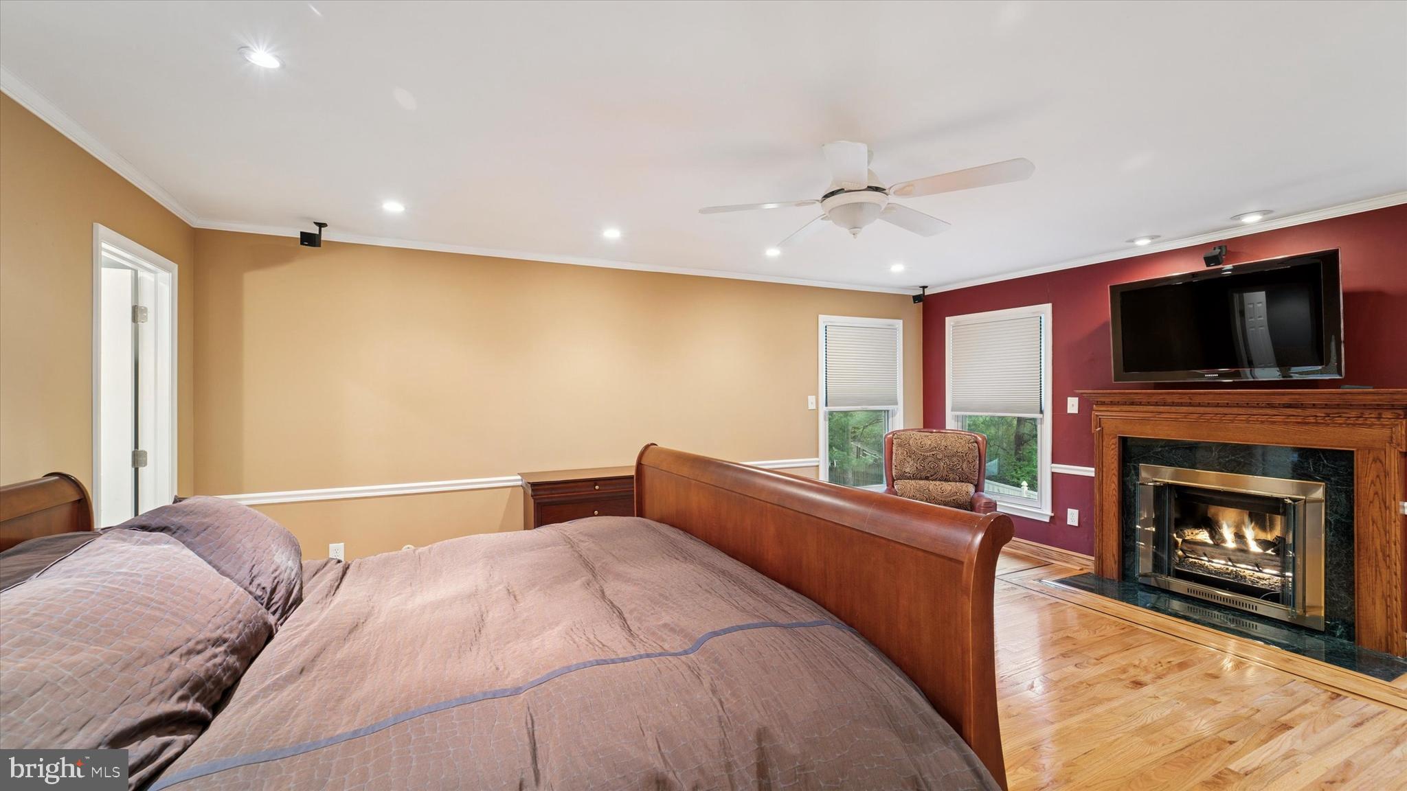 115 Union Mill Terrace Mount Laurel, NJ 08054 - Photo 18 of 31 a bedroom with a bed and a fireplace