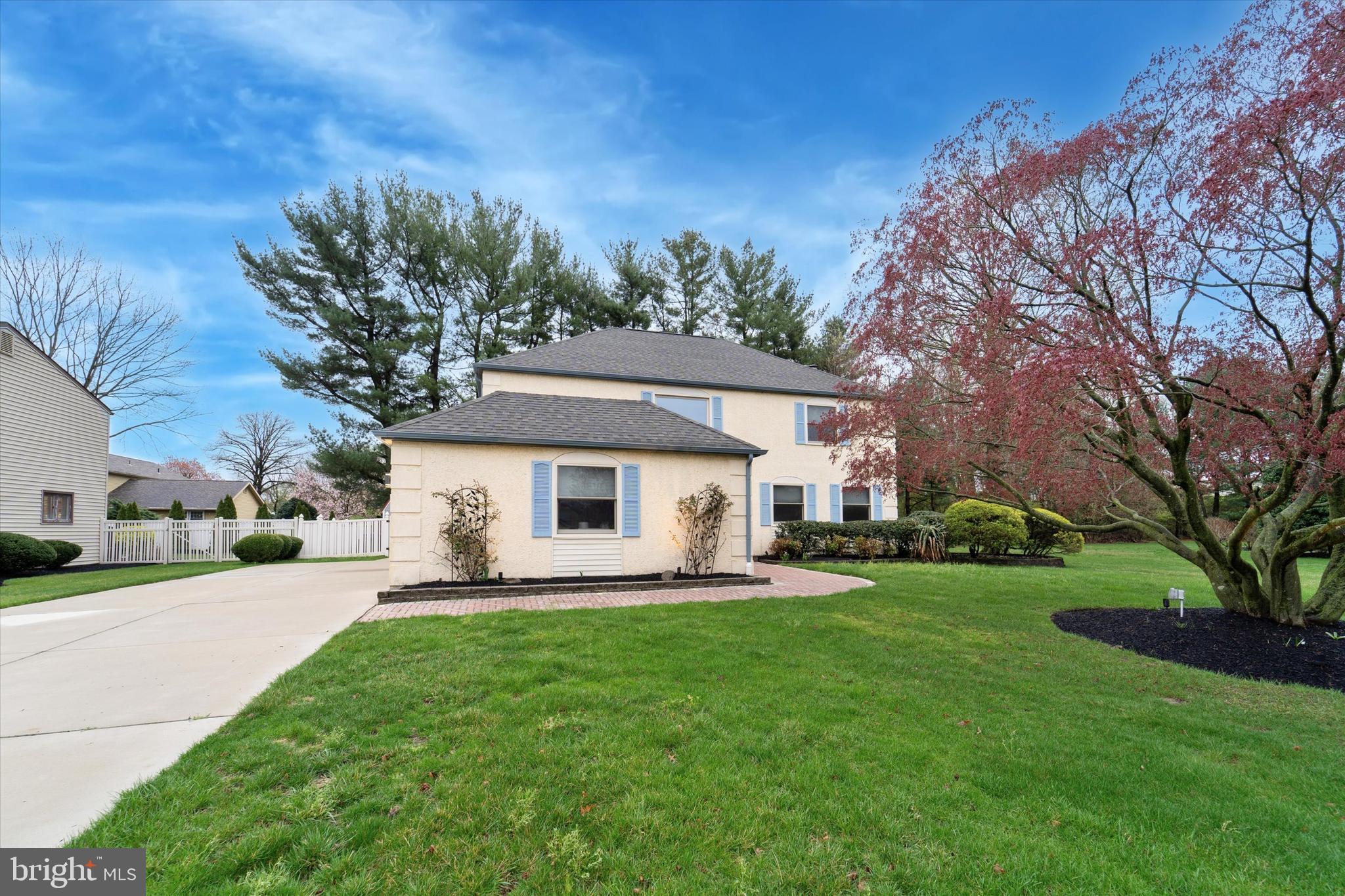 115 Union Mill Terrace Mount Laurel, NJ 08054 - Photo 2 of 31 a front view of a house with a yard and trees