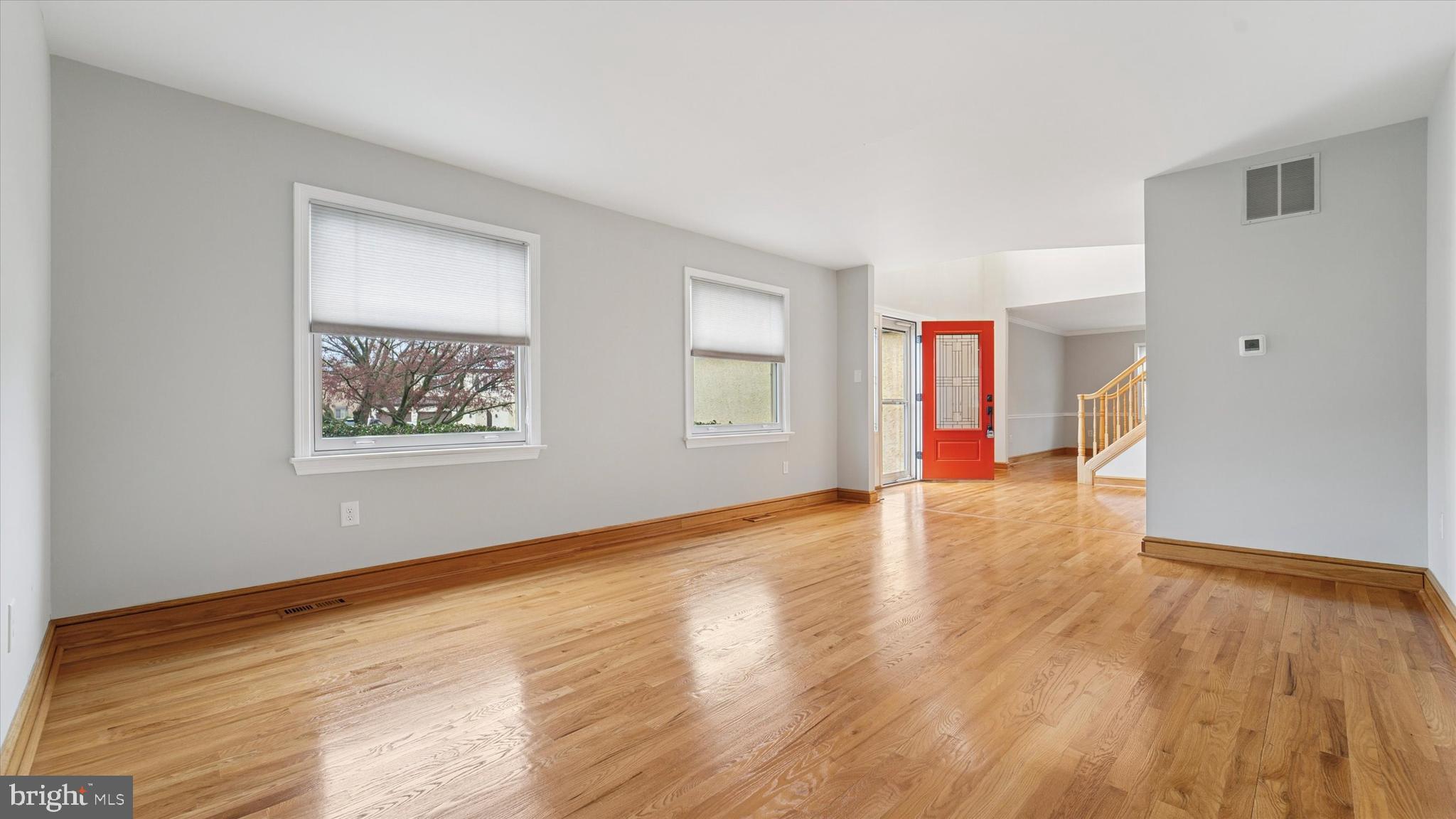 115 Union Mill Terrace Mount Laurel, NJ 08054 - Photo 7 of 31 a view of an empty room with wooden floor and a window
