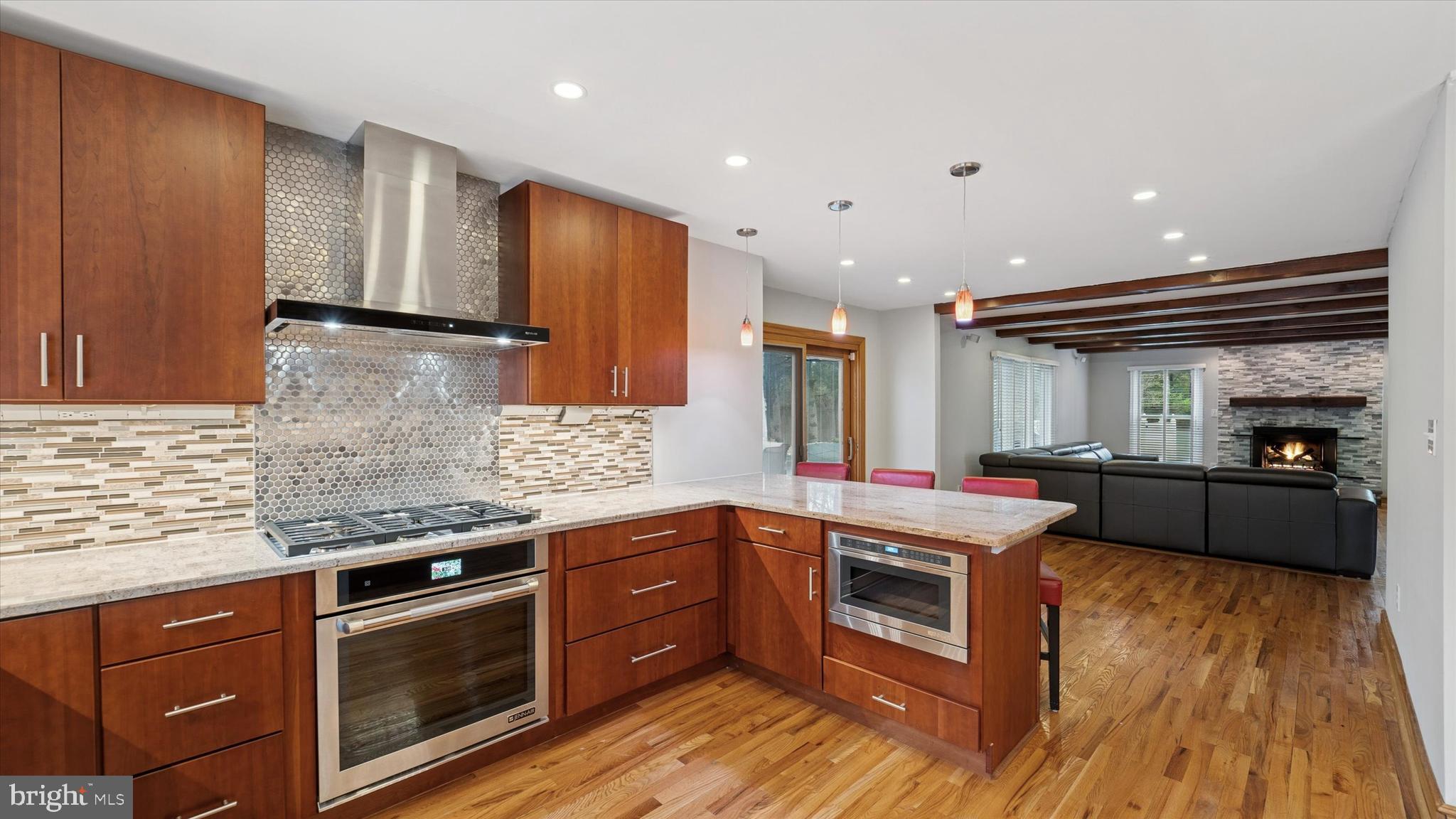 115 Union Mill Terrace Mount Laurel, NJ 08054 - Photo 9 of 31 a kitchen with stainless steel appliances granite countertop a stove a sink and a refrigerator