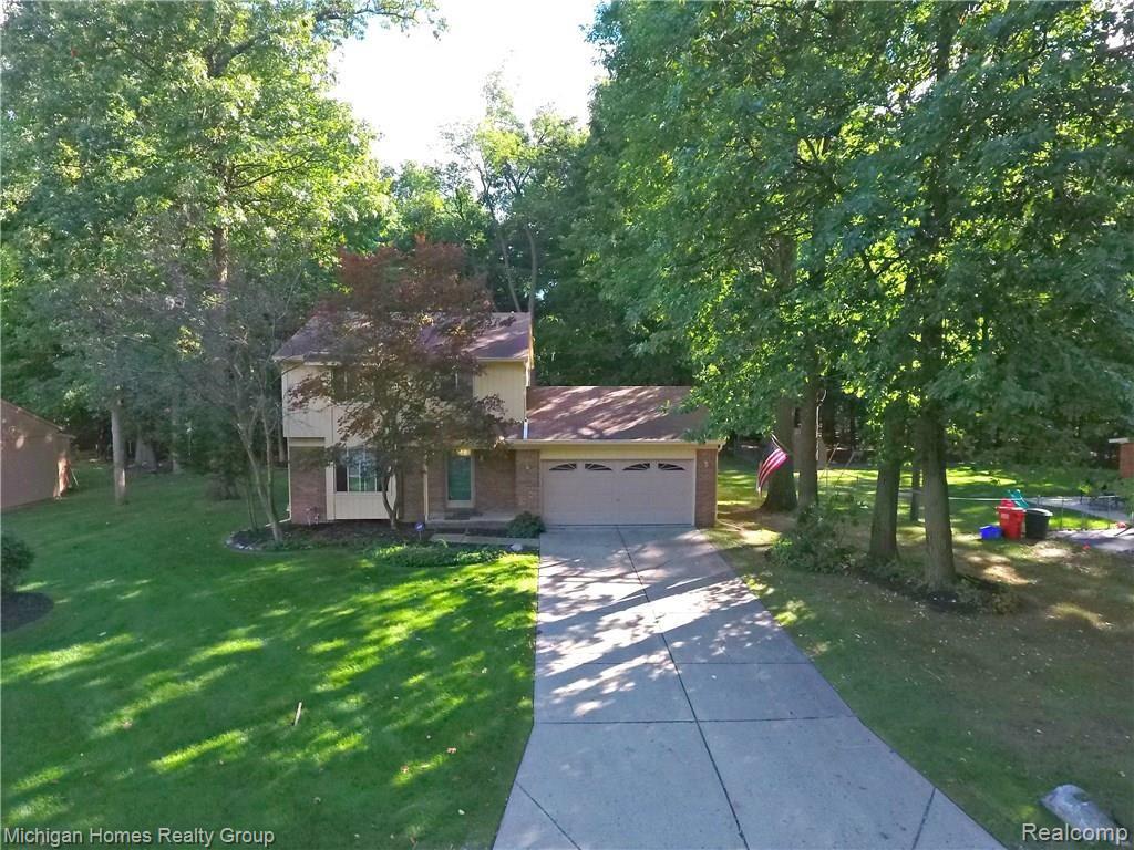 1410 Omega Road Walled Lake, MI 48390 - Photo 2 of 23 Omega Rd Front Aerial.jpg