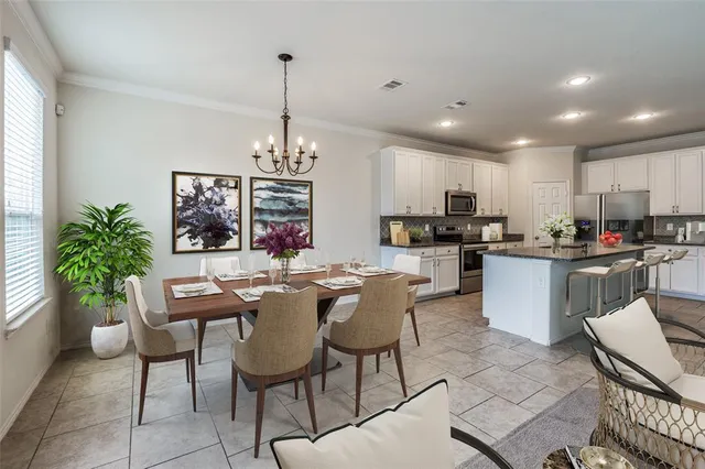 a view of a dining room kitchen and a counter top space