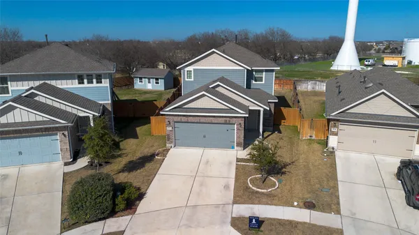 an aerial view of a house with a garden