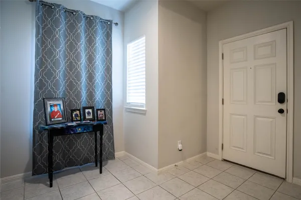 a view of room with window and hardwood