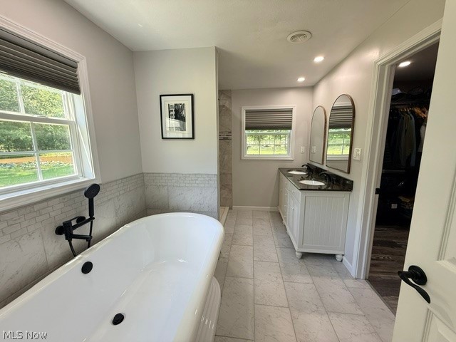4139 Austin Road Geneva, OH 44041 - Photo 23 of 41 Double vanity, walk in shower and soaking tub