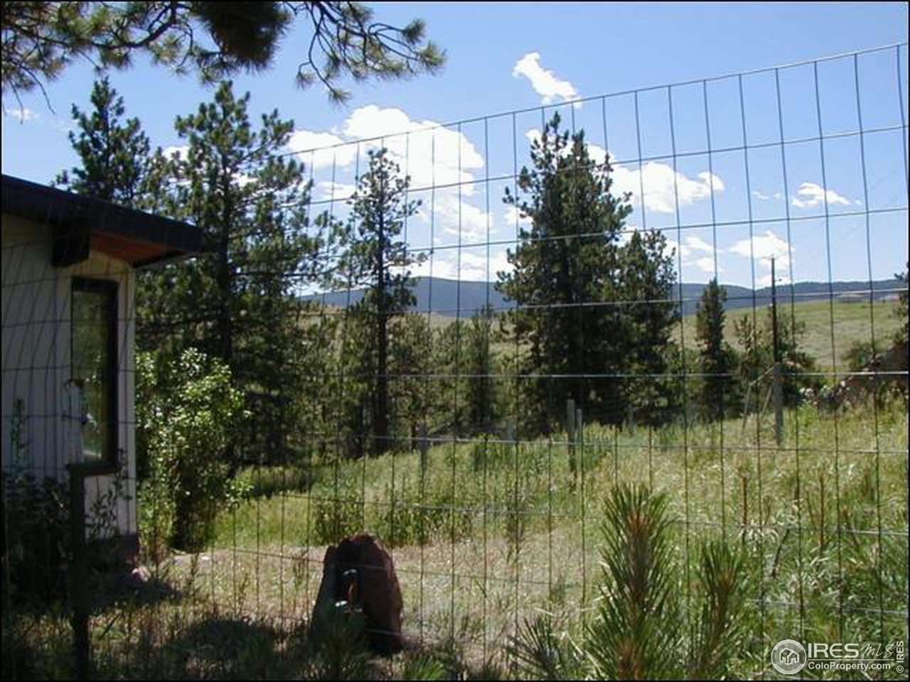3032 Sugarloaf Road Boulder, CO 80302 - Photo 5 of 5 a view of a garden