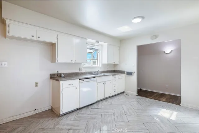 a large kitchen with cabinets