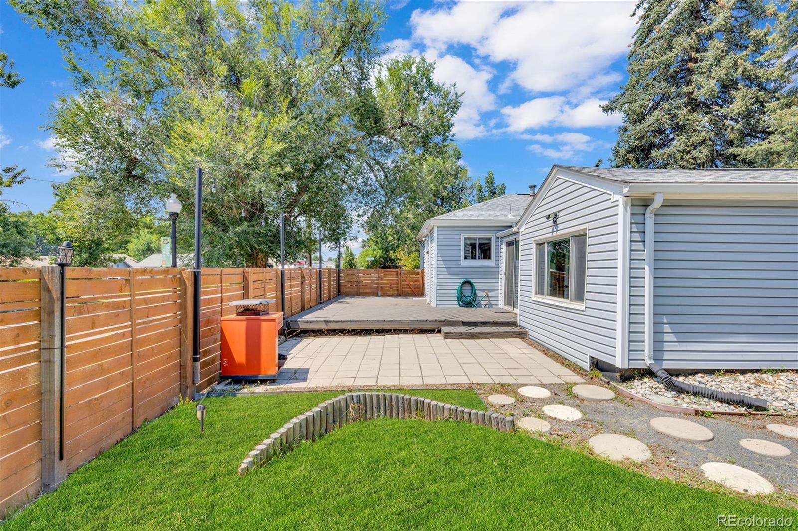 2900 Benton Street Wheat Ridge, CO 80214 - Photo 35 of 43 a view of a backyard with sitting area