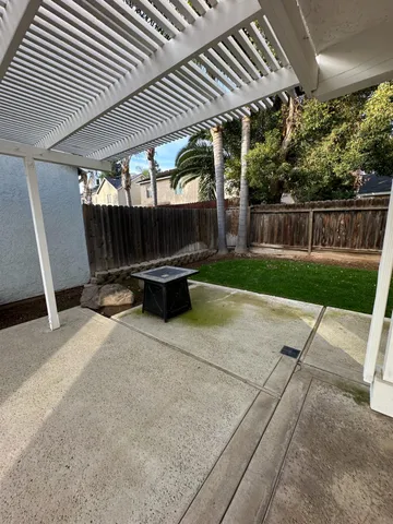 a view of backyard with green space