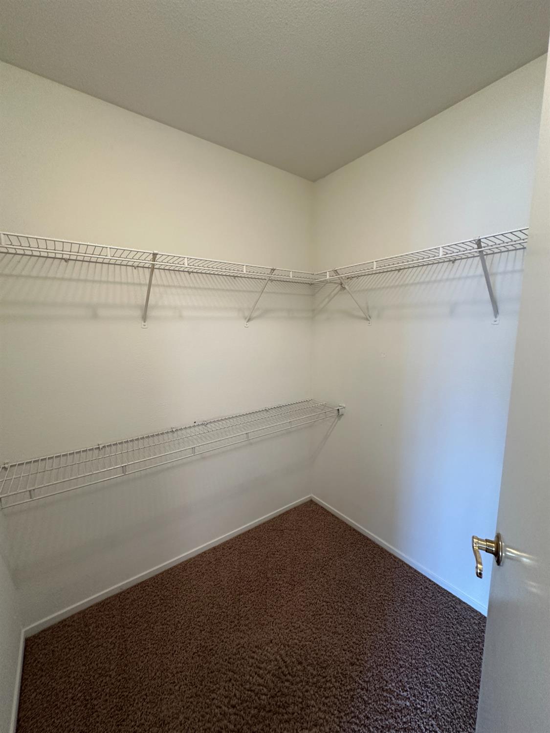 1816 East Frederick Avenue Fresno, CA 93720 - Photo 28 of 29 a view of a room with racks on the wall