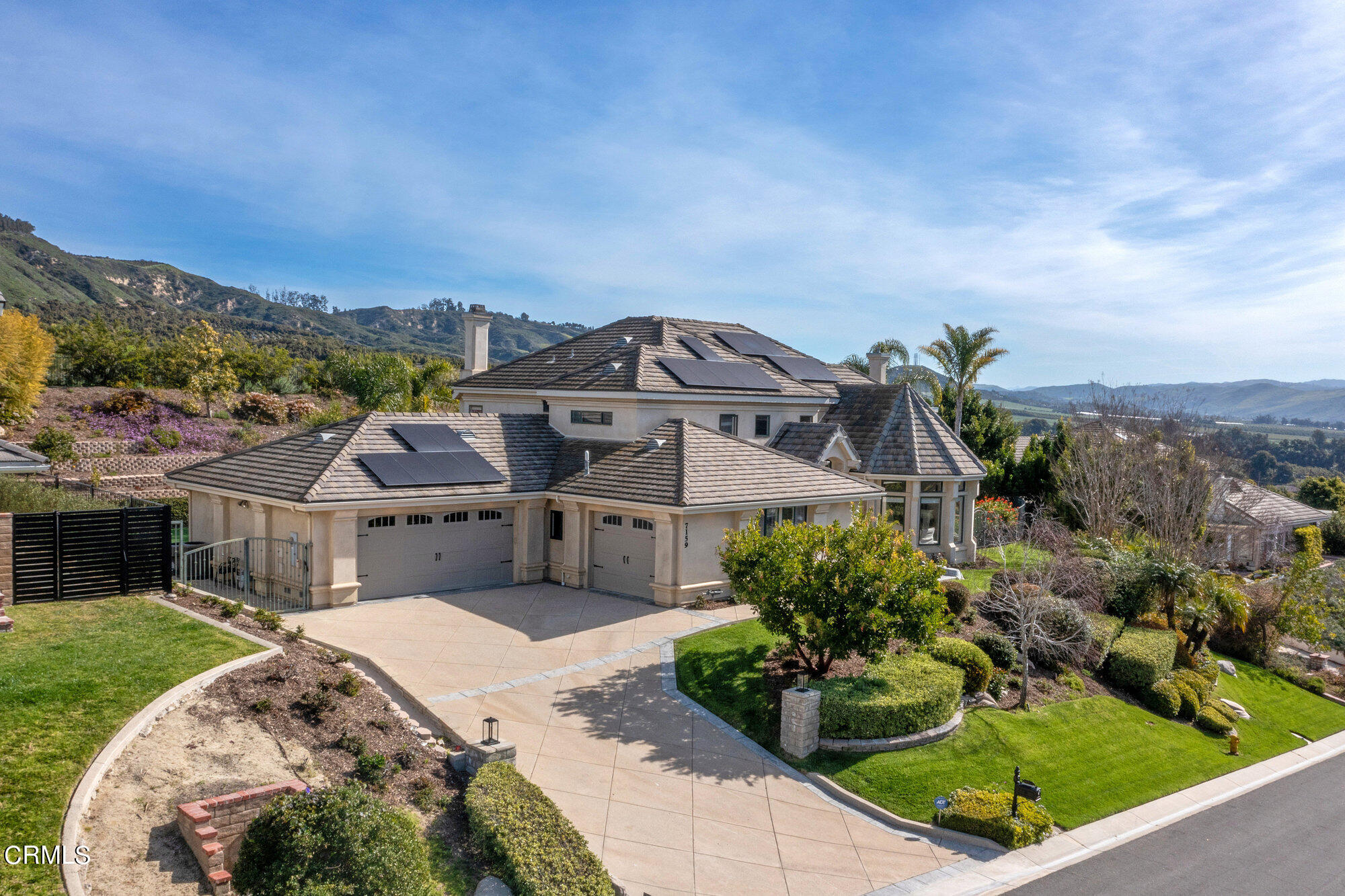 7159 Los Coyotes Place Camarillo, CA 93012 - Photo 14 of 73 a view of a house with a big yard plants and large trees