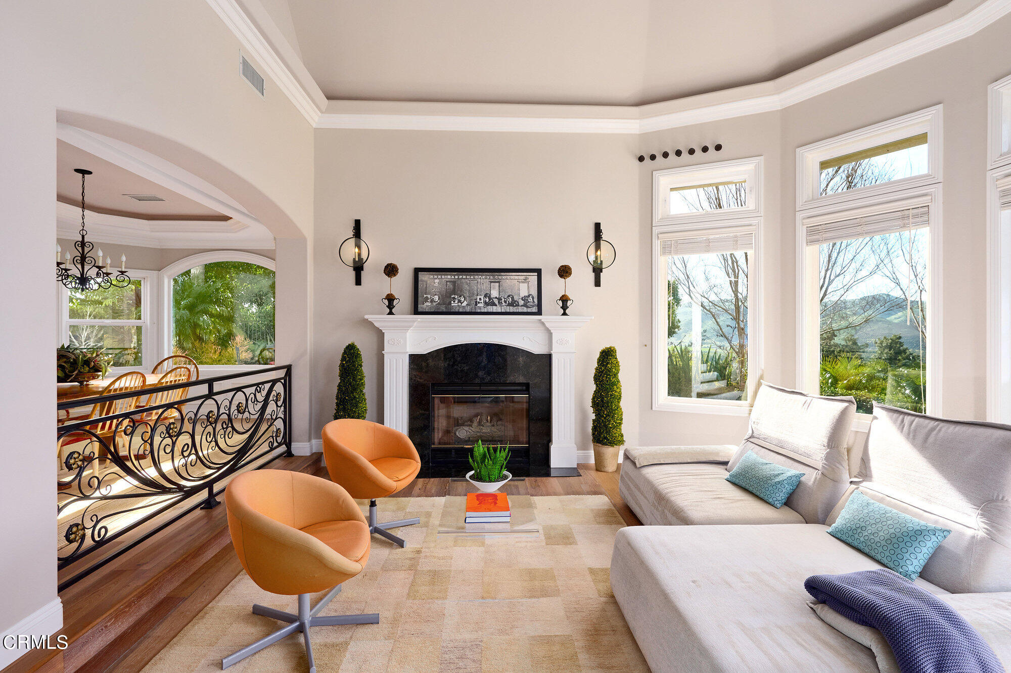 7159 Los Coyotes Place Camarillo, CA 93012 - Photo 27 of 73 a living room with furniture a fireplace and a large window