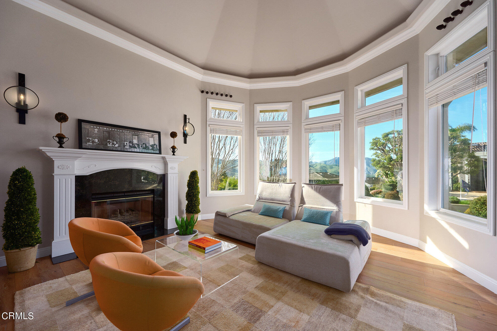 7159 Los Coyotes Place Camarillo, CA 93012 - Photo 5 of 73 a living room with furniture a large window and a fireplace