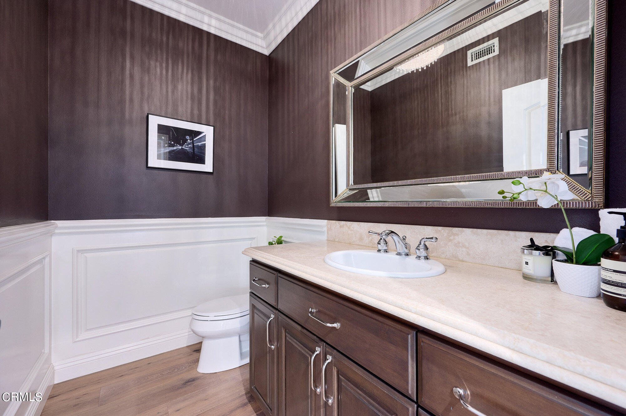 7159 Los Coyotes Place Camarillo, CA 93012 - Photo 57 of 73 a bathroom with a sink a toilet and mirror