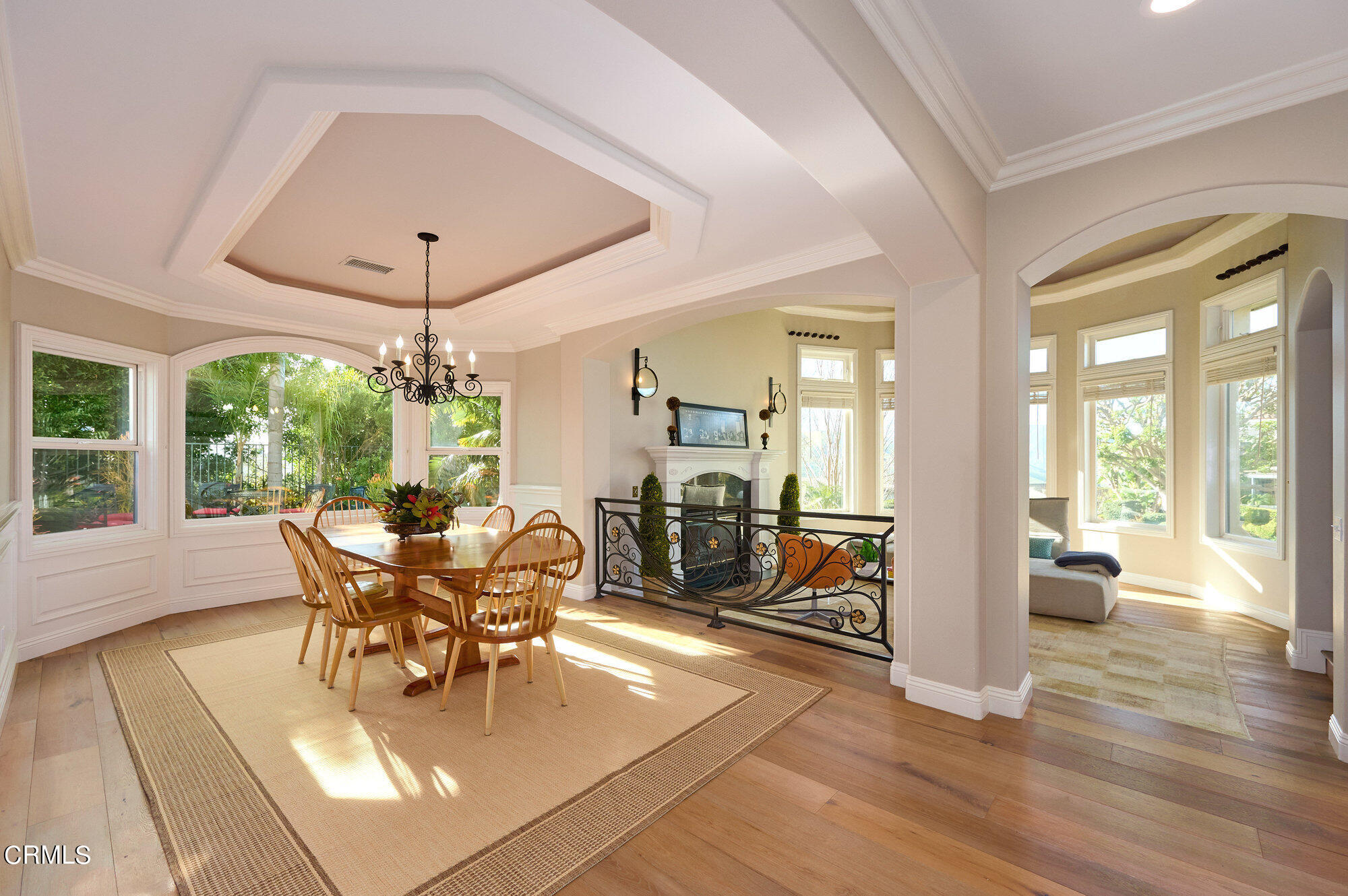 7159 Los Coyotes Place Camarillo, CA 93012 - Photo 6 of 73 a view of a dining room with furniture wooden floor and chandelier