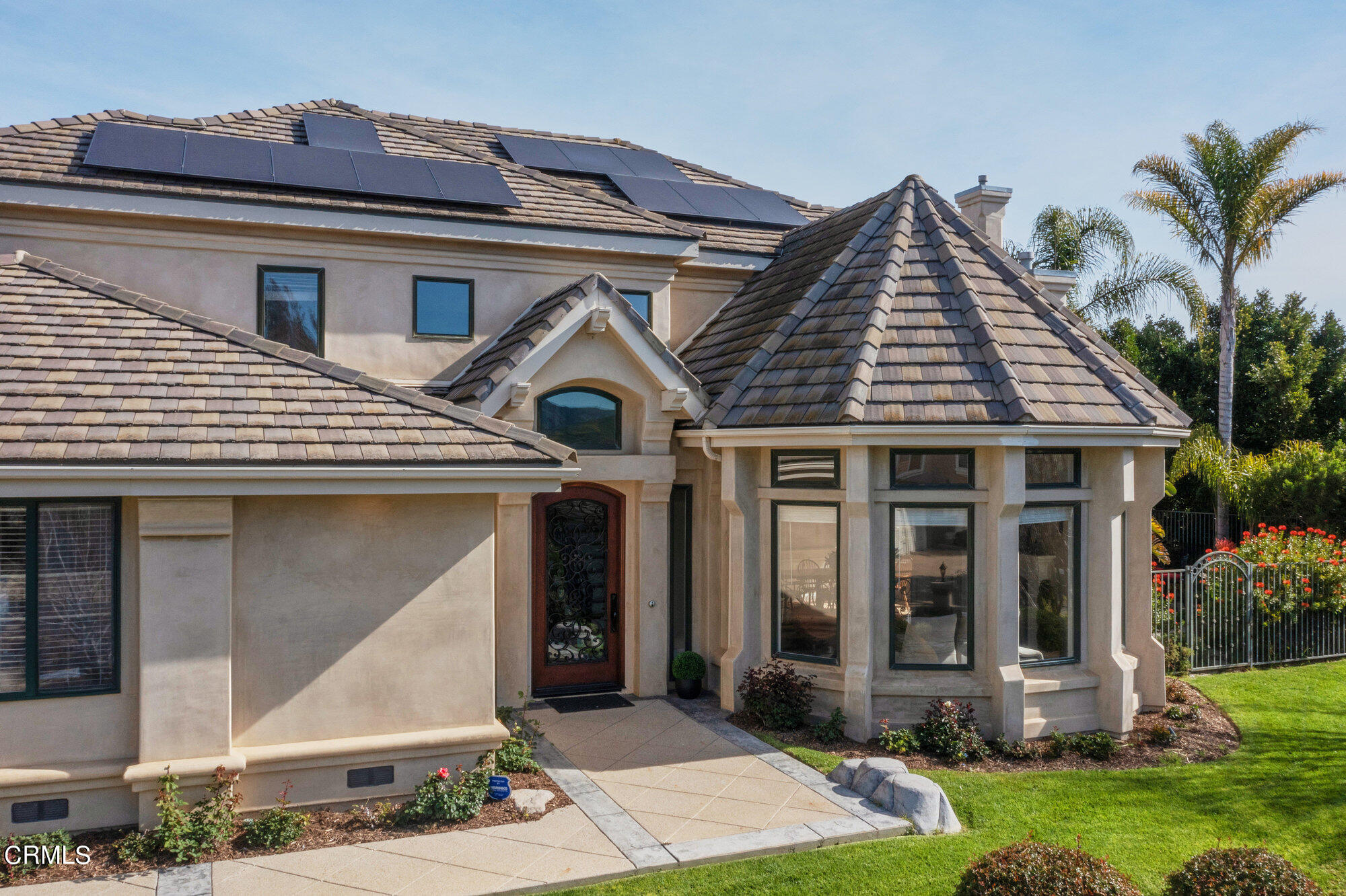 7159 Los Coyotes Place Camarillo, CA 93012 - Photo 64 of 73 a front view of a house with a yard