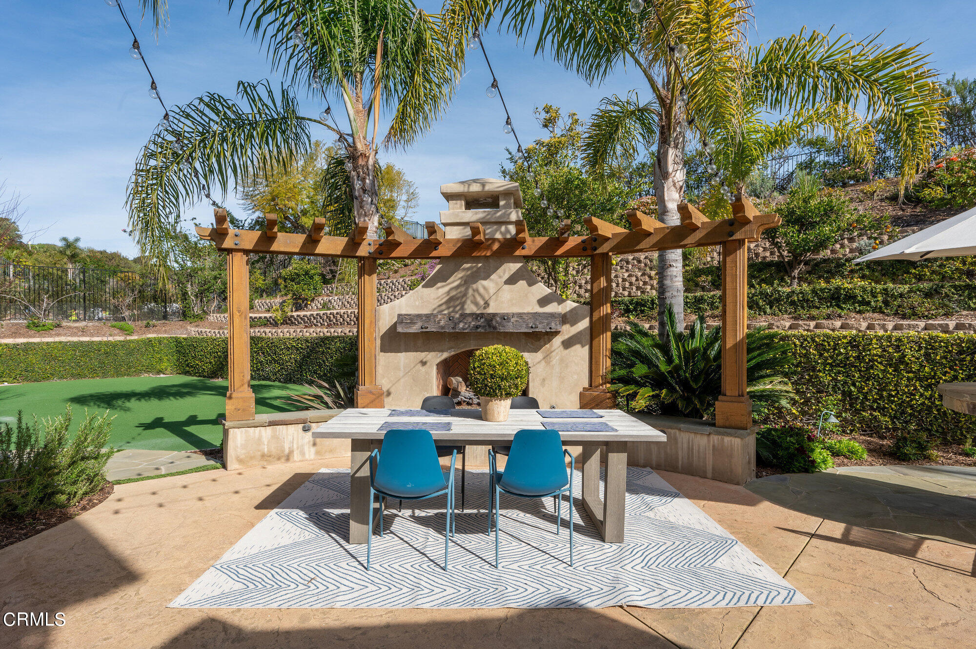7159 Los Coyotes Place Camarillo, CA 93012 - Photo 66 of 73 a view of a patio with a table and chairs and a fire pit