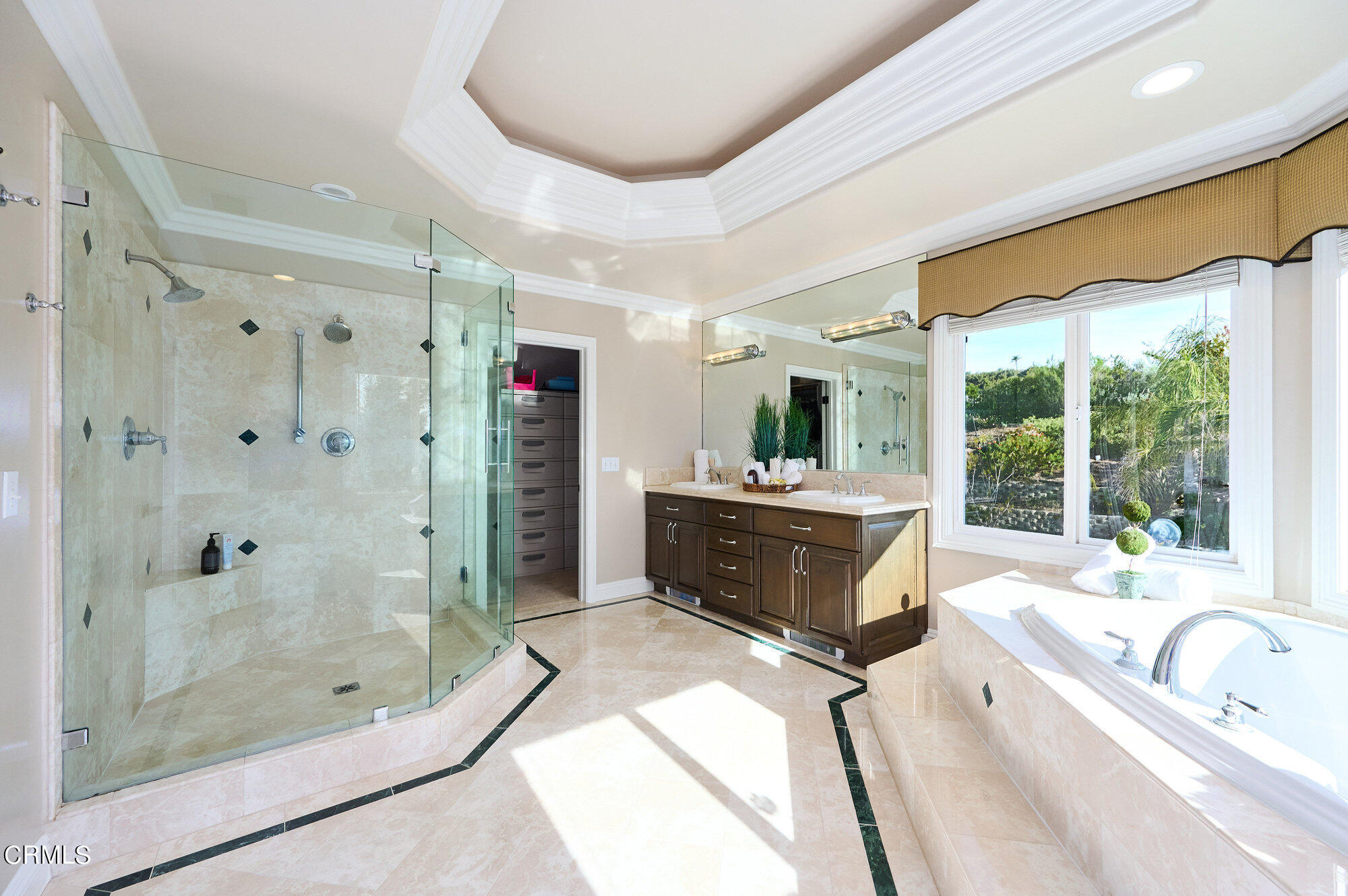 7159 Los Coyotes Place Camarillo, CA 93012 - Photo 8 of 73 a spacious bathroom with a tub sink shower and mirror