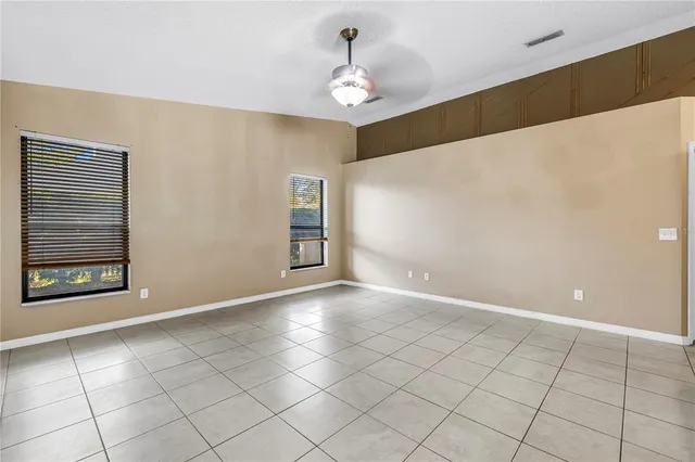 a view of an empty room and window