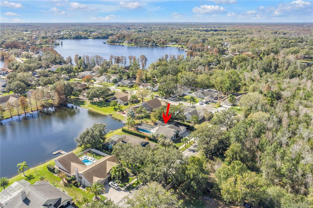8436 Ridgebrook Circle Odessa, FL 33556 - Photo 21 of 58 a view of a lake with mountains in front of it
