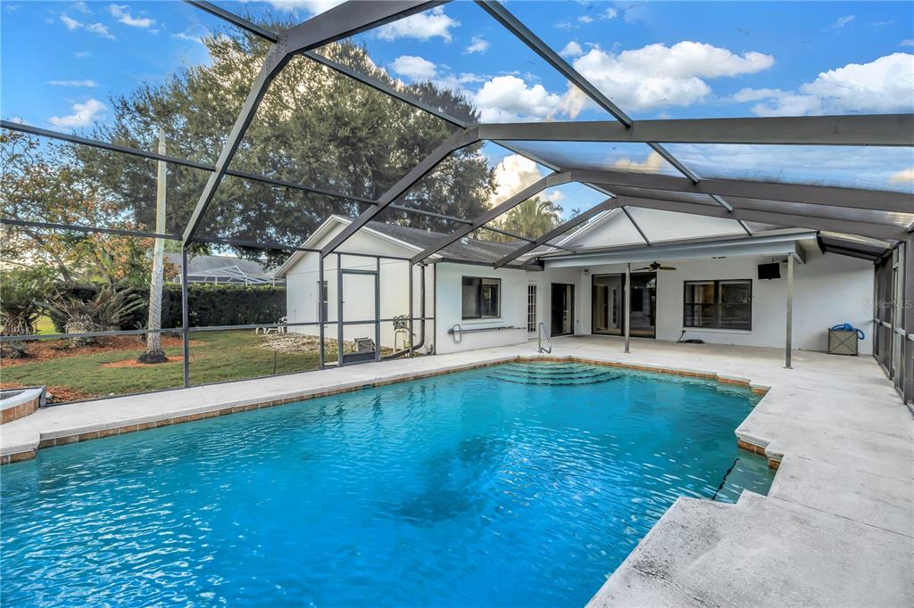 8436 Ridgebrook Circle Odessa, FL 33556 - Photo 31 of 58 a view of a house with swimming pool