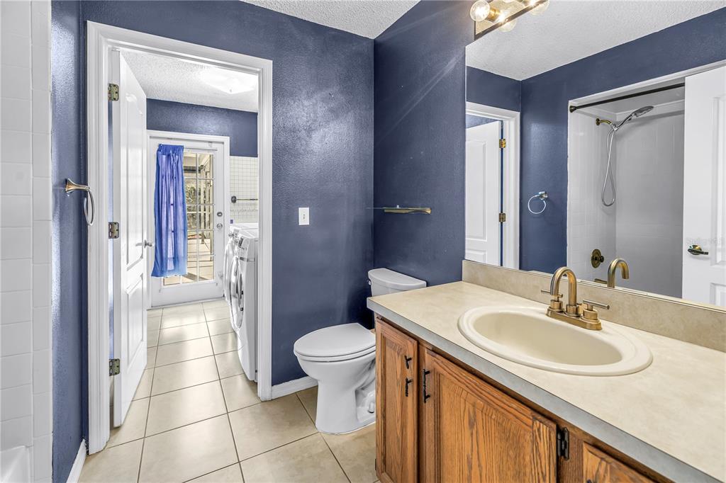 8436 Ridgebrook Circle Odessa, FL 33556 - Photo 40 of 58 a bathroom with a sink toilet and shower