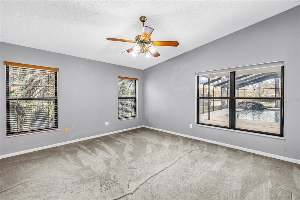 8436 Ridgebrook Circle Odessa, FL 33556 - Photo 49 of 58 a view of an empty room with a window