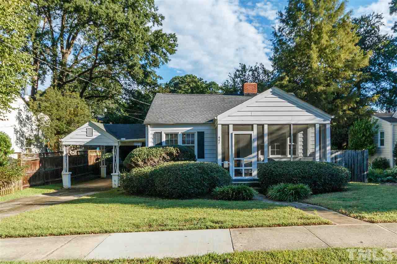 607 Frank Street Raleigh, NC 27604 - Photo 1 of 23 a front view of a house with a garden