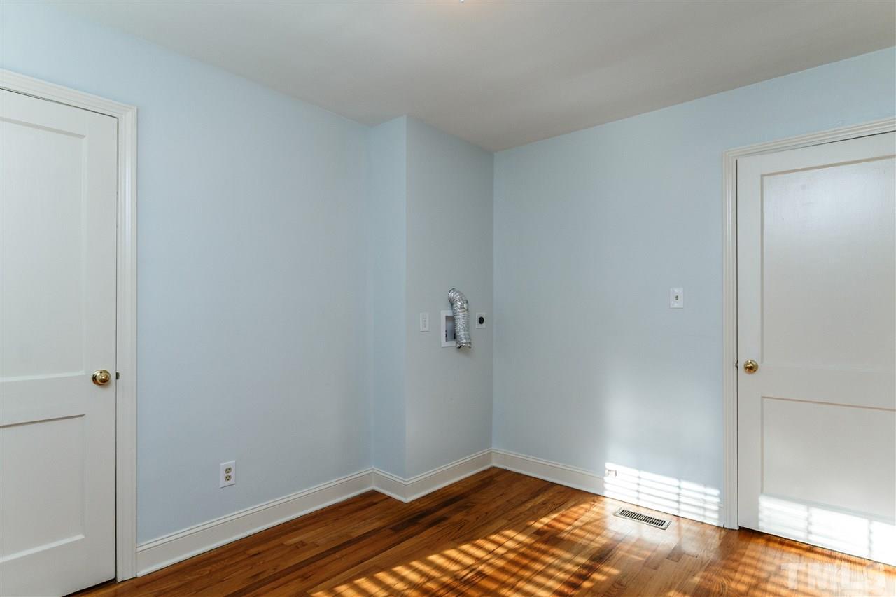 607 Frank Street Raleigh, NC 27604 - Photo 12 of 23 a view of room with wooden floor