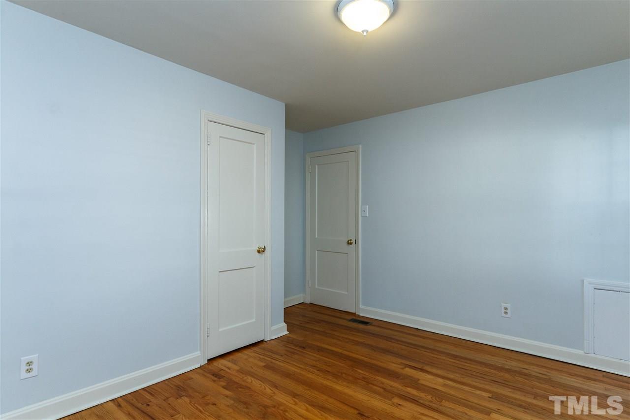 607 Frank Street Raleigh, NC 27604 - Photo 18 of 23 a view of an empty room and wooden floor