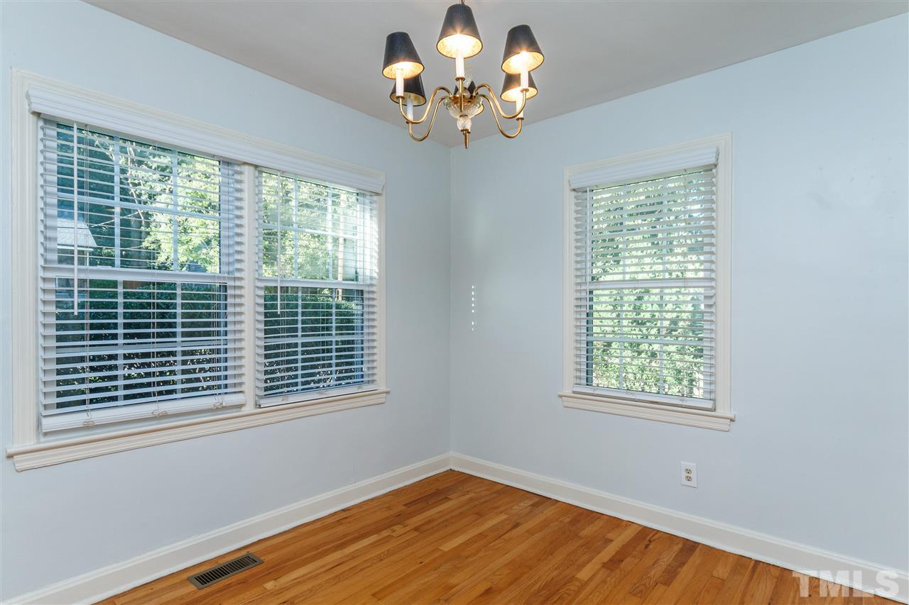 607 Frank Street Raleigh, NC 27604 - Photo 7 of 23 a view of an empty room with a window