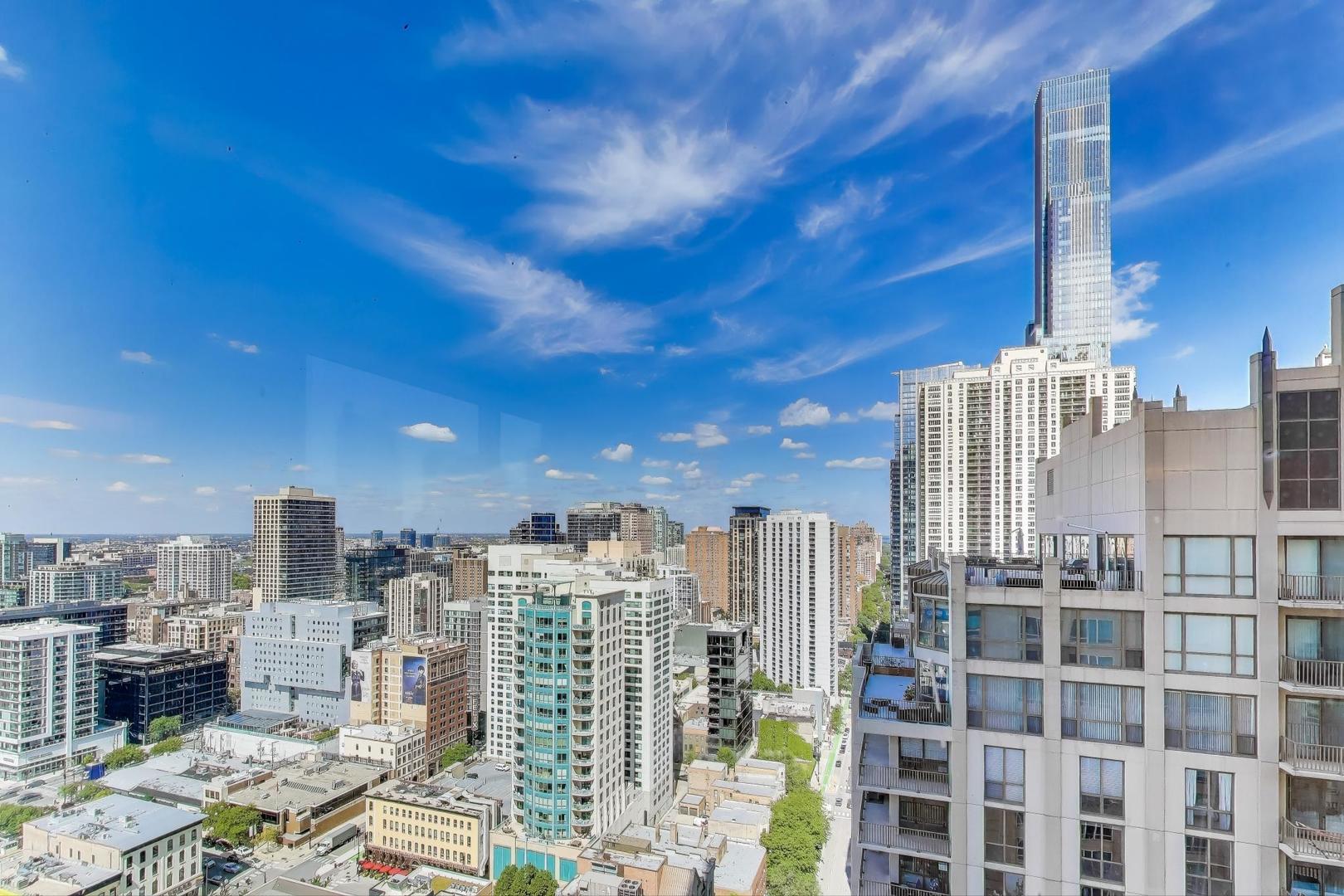 33 West Ontario Street, Unit 30G Chicago, IL 60654 - Photo 9 of 25 a view of a city with tall buildings
